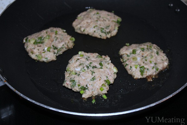 tasty tuna cakes cooking in coconut