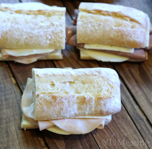 three picnic sandwiches