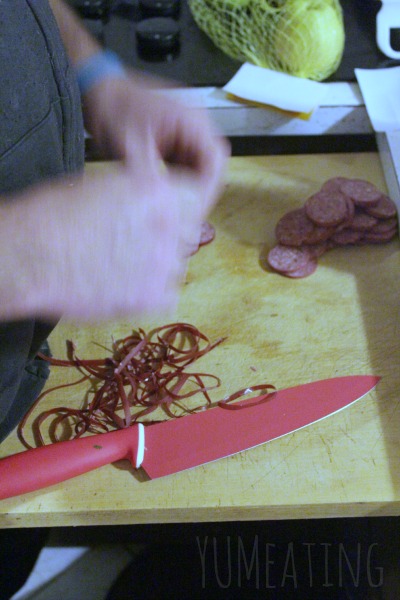 cutting up summer sausage